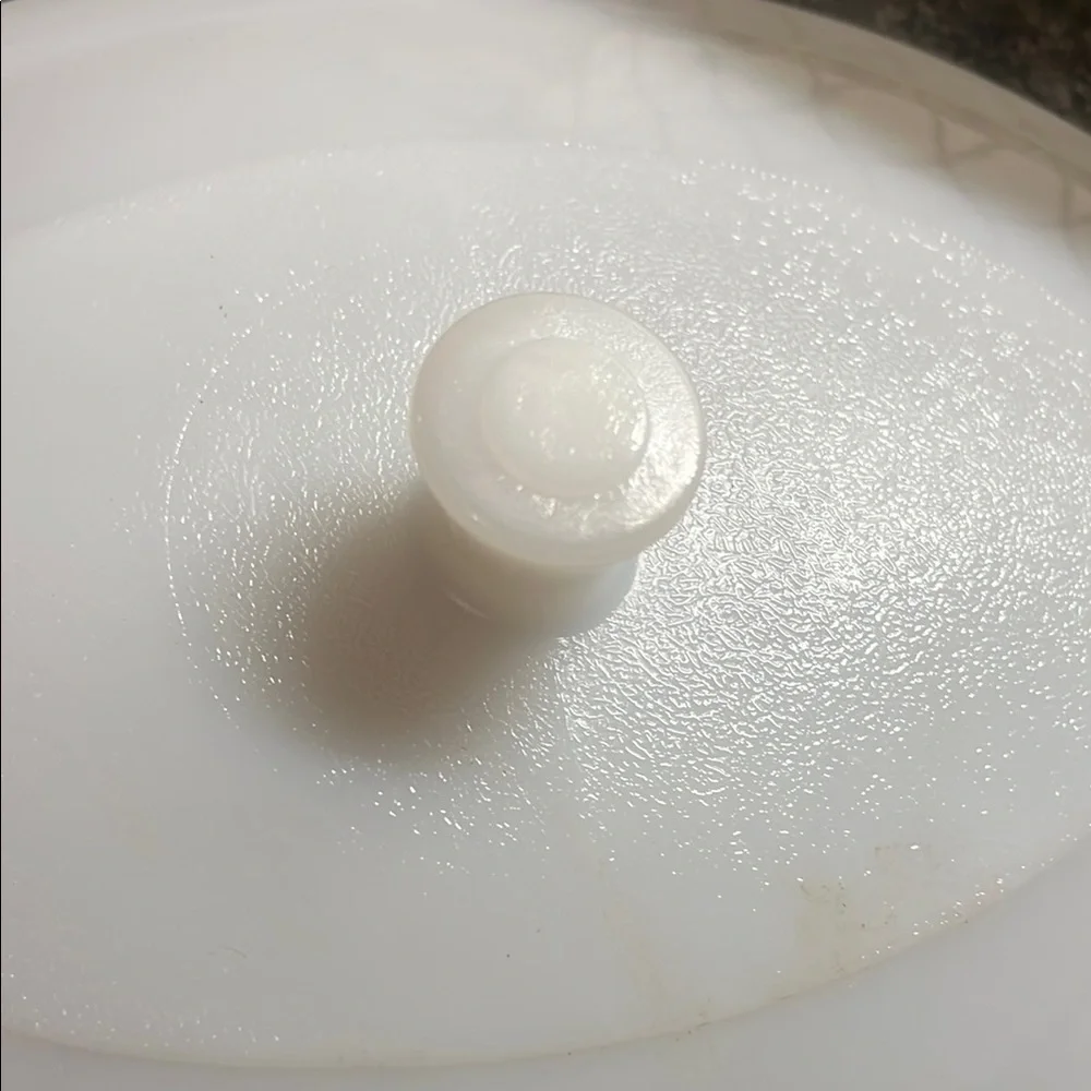 Vintage milk glass covered casserole dish by Glass Bake. Tag still inside